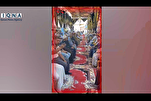 Əbdül-Basitin oğlu Mustafa İslamil oğlunun dəfn mərasimində Quran oxuyur
