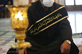 آیین تعویض پرچم و اقامه عزا در حرم حضرت معصومه(س)