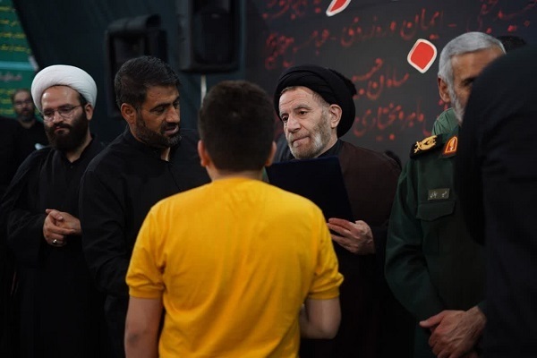 مراسم یادبود شهدای جنگ تحمیلی 12 روزه در خرم‌آباد