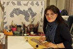 Une calligraphe de Mossoul unit Coran, écriture arabe et cartes des pays